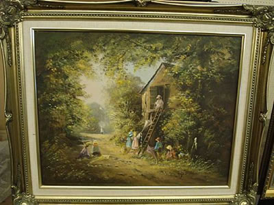 Children with kites by a barn