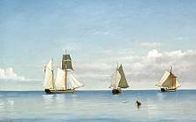 Sailing ships at sea on a calm day