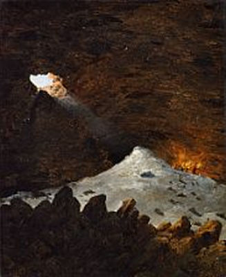 Light coming through a mountain wall to a cave