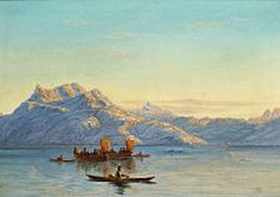 Kayaks and umiaks on a Greenlandic fiord