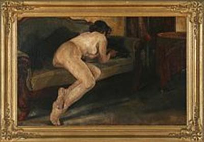 Naken woman on a sofa