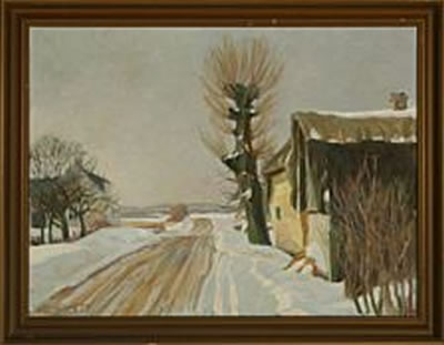 Wintry scene with houses at the roadside