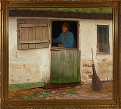 A farmer standing in the stable door
