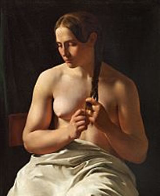 The model Catrine Nielsen, called Trine, is plaiting her hair