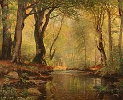 Serpentine stream in a spring forest.