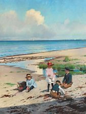 Summer day on the beach at Hornbæk with children playing.