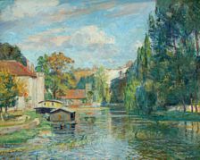 City scene by a river.