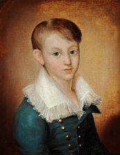 Portrait of a boy in a blue jacket.