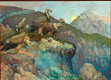 Mountainous landscape at sunset with vultures looking for a prey