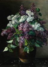 A bouquet with white and purple lilacs in a vase