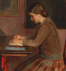 A girl at a writing desk