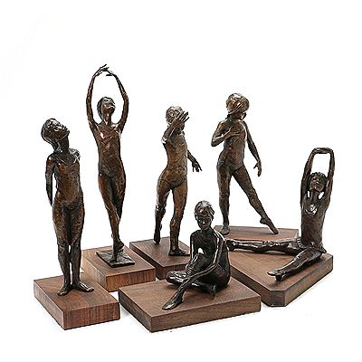 Six patinated bronze figures on wooden bases