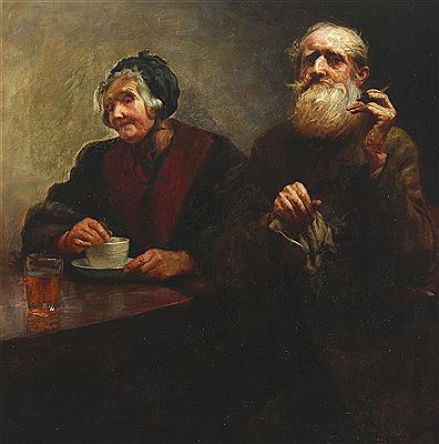 Portrait of an elderly couple at a table with drinks.
