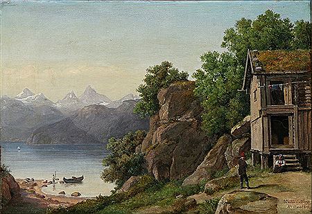 Norwegian landscape at a fjord. In the foreground an old farmhouse.