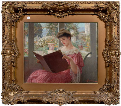 Woman reading on a porch in a garden