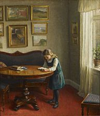 Interior with girl reading by a table