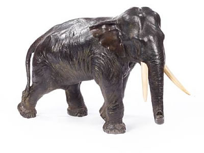 A massive Japanese bronze model of an Indian bull elephant with ivory tusks by Seiya Genryusai - Auction record, sale price, and art valuation. Compare with similar artists and explore comparable artworks.