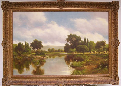 Summer landscape with river and haystacks
