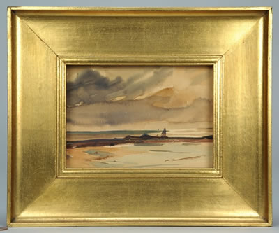 Landscape of a beach under a clouded sky