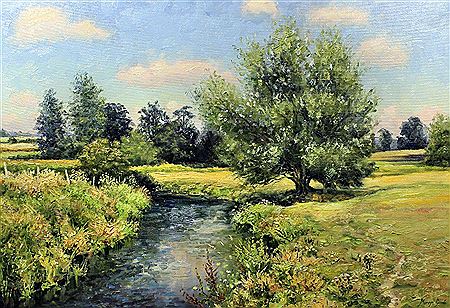 Willow in full leaf on the river bank