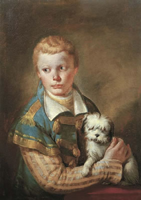 Portrait of a young boy with a dog