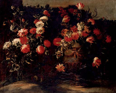 Tulips, roses, daffodils and other flowers in an urn, on a stone