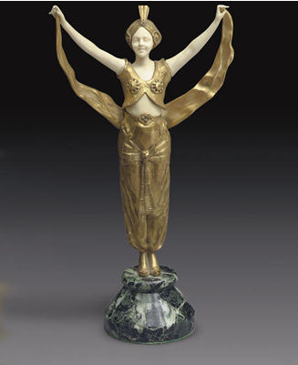 A FRENCH GILT-BRONZE AND IVORY FIGURE OF A MOORISH DANCER