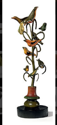 A CARVED AND PAINTED TEN-BIRD BIRD TREE