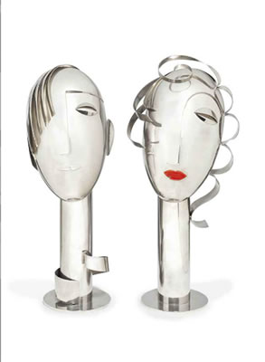 A PAIR OF NICKELED-METAL HEADS