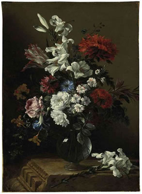 Lilies, roses, tulips, carnations, and other flowers in a glass vase on a classical architectural fragment