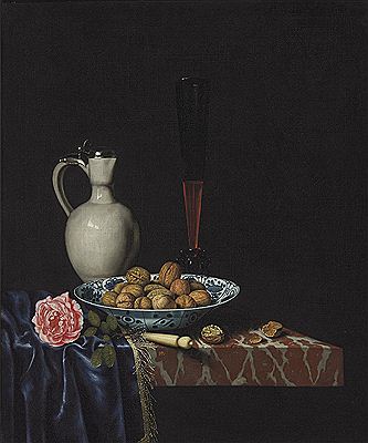 A wan-li bowl with walnuts, a façon de venise wine glass, an ivory-handled knife, a Delft stoneware jug and a rose on a partially draped marble ledge