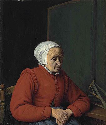 Portrait of an elderly lady in a red coat, seated by a table with a flax winder
