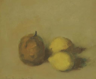 A still life with a pear and two lemons