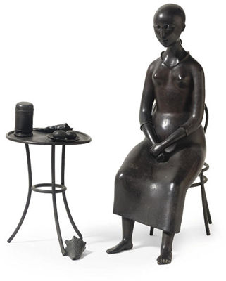 Seated woman at table