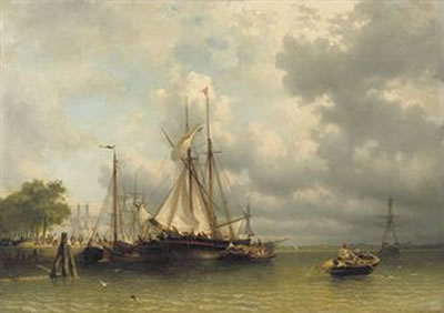 Sailing boats moored at a busy quay