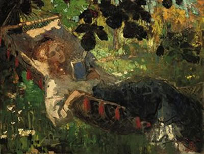A girl reading in a hammock