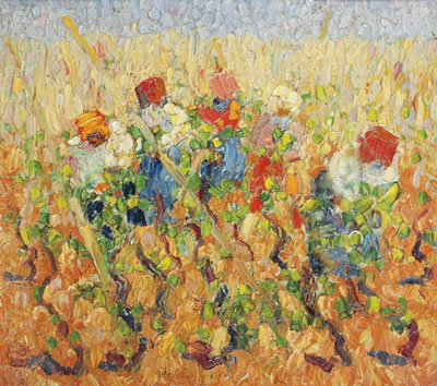 Farmers working the field