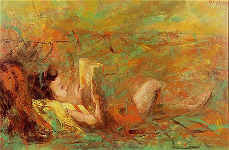 A young girl reading while lying down