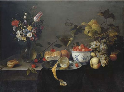 A tulip, a carnation, an iris and other flowers in a glass vase, wild strawberries in a Wan-li 'kraak' porselain bowl, a partly-peeled lemon on a pewter platter with cherries, an orange, a wine glass, apples and grapes on a draped ledge