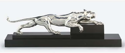 A SILVERED BRONZE MODEL OF A PANTHER