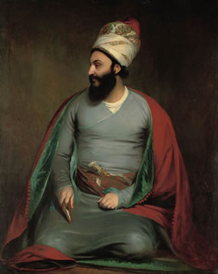 Portrait of Mirza Abu'l Hassan Khan, Envoy Extraordinary and Minister Plenipotentiary to the Court of King George III, kneeling in a red cloak with a blue lining, and a white and red embroidered floral turban, holding a Koran in his right hand