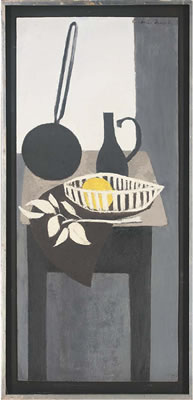 A long handled frying pan, pitcher and a grapefruit in a basket, on a table