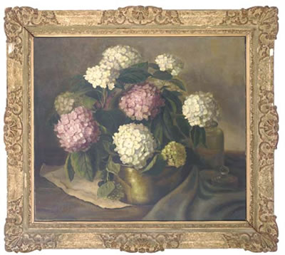 Pink and white hydrangeas in a copper pot