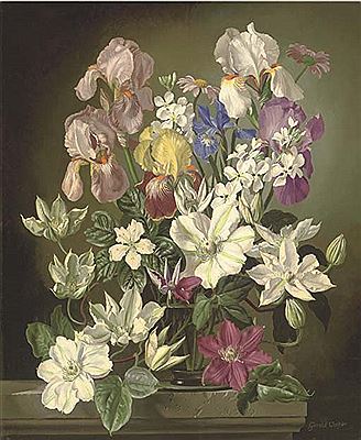 Iris and clematis in a glass vase
