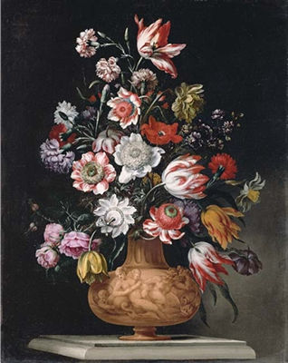 Tulips, roses and carnations and a narcissus in a sculpter urn on a stone ledge