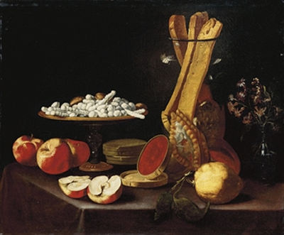 Sweets on a tazza, narcissi in a glass vase, breadsticks in a jar, and apples, jelly and a lemon on a draped table