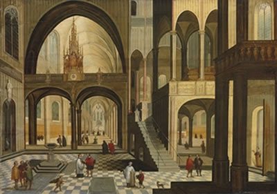 The interior of a Gothic church with a carved roodscreen