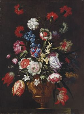 Roses, tulips, carnations and other flowers in a sculptural bronze copper urn, on a stone pedestal