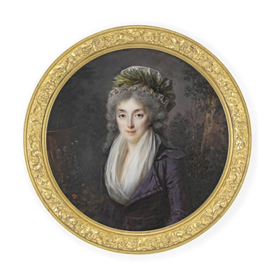 A fine miniature of a young lady in a landscape