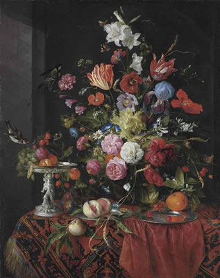 Flowers in a glass vase on a draped table, with a silver tazza, fruit, insects and birds